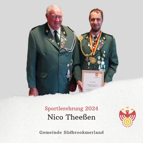 Zwei Personen lächeln in die Kamera
