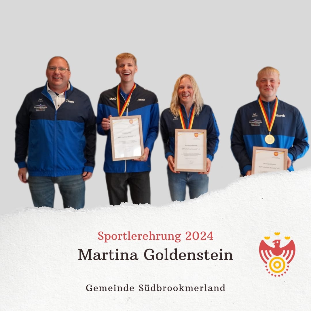 Sportlerehrung 2024. Mehrere Personen mit Medaillen und Urkunden lächeln in die Kamera