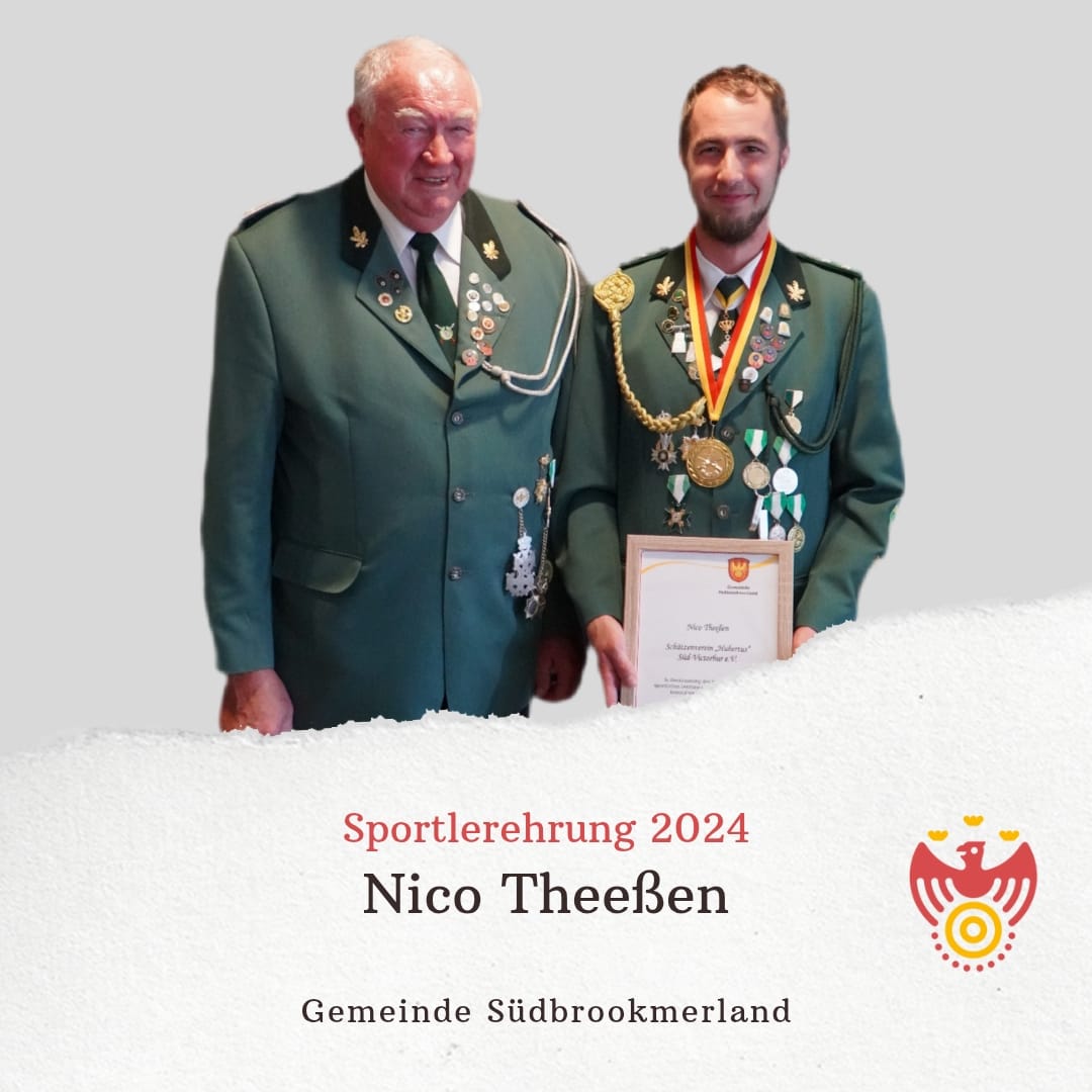 Zwei Personen lächeln in die Kamera